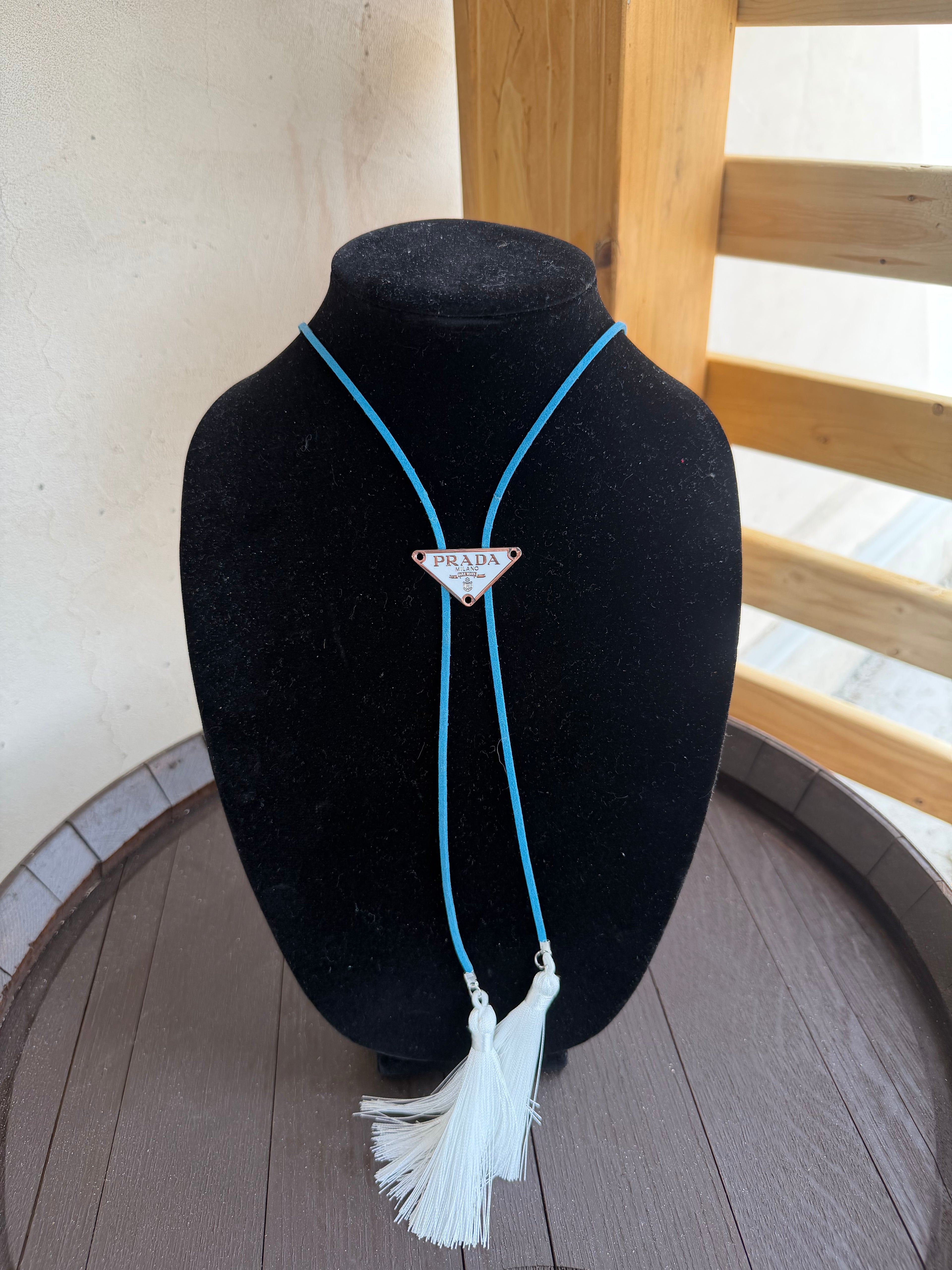 Blue Prada Fringe Bolo