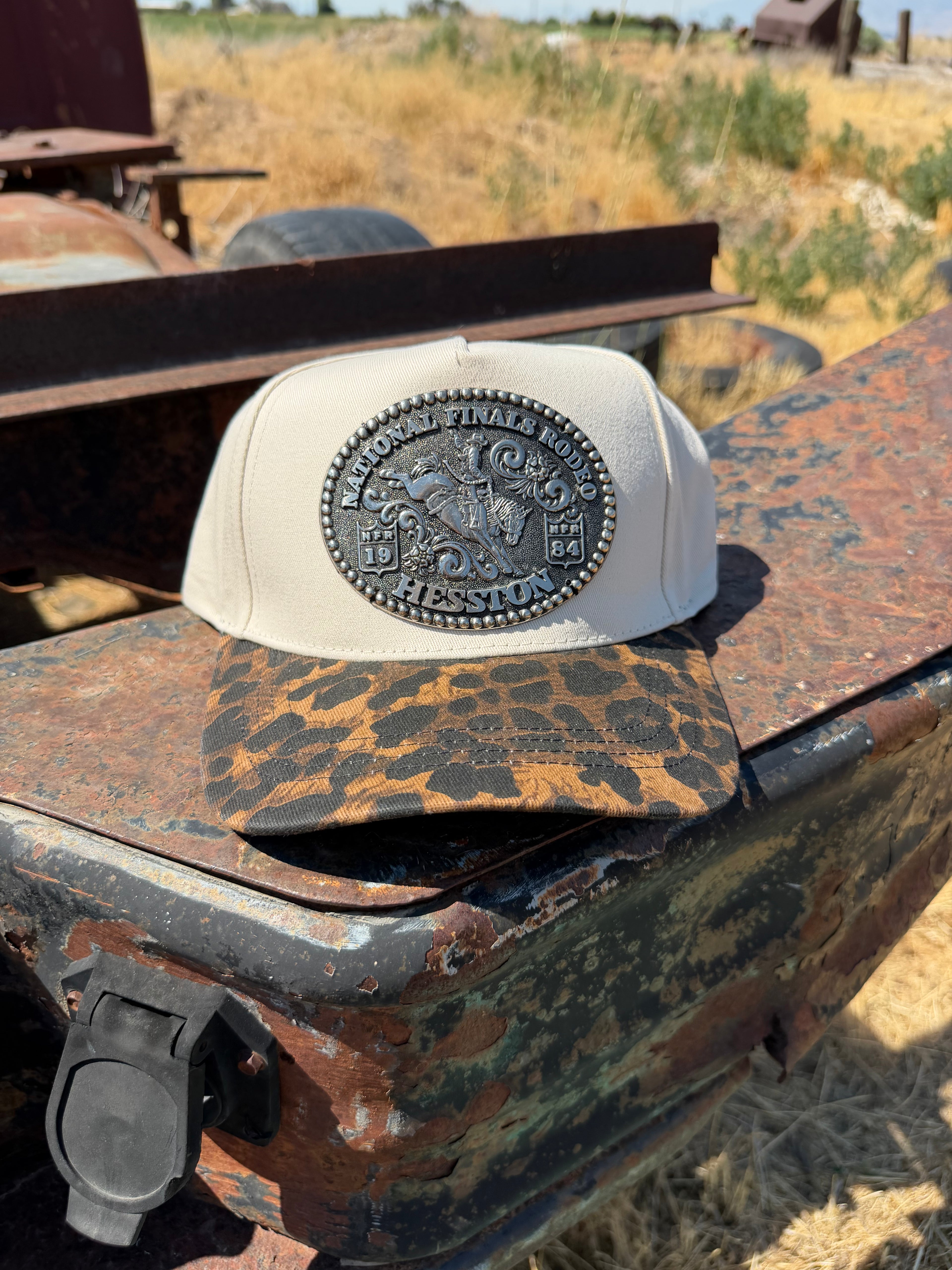 1984 Hesston NFR Buckle on a leopard hat