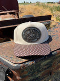 1984 Hesston NFR Buckle on a brown polka dot hat